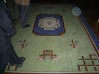 3. Det är också Alf Munthe som designat mattan i caféet.